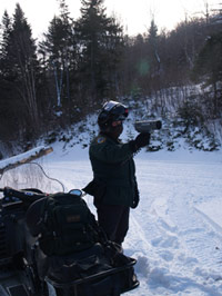 Police checking the speed of snowmobilers