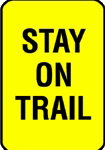 Stay on trail snowmobiling sign