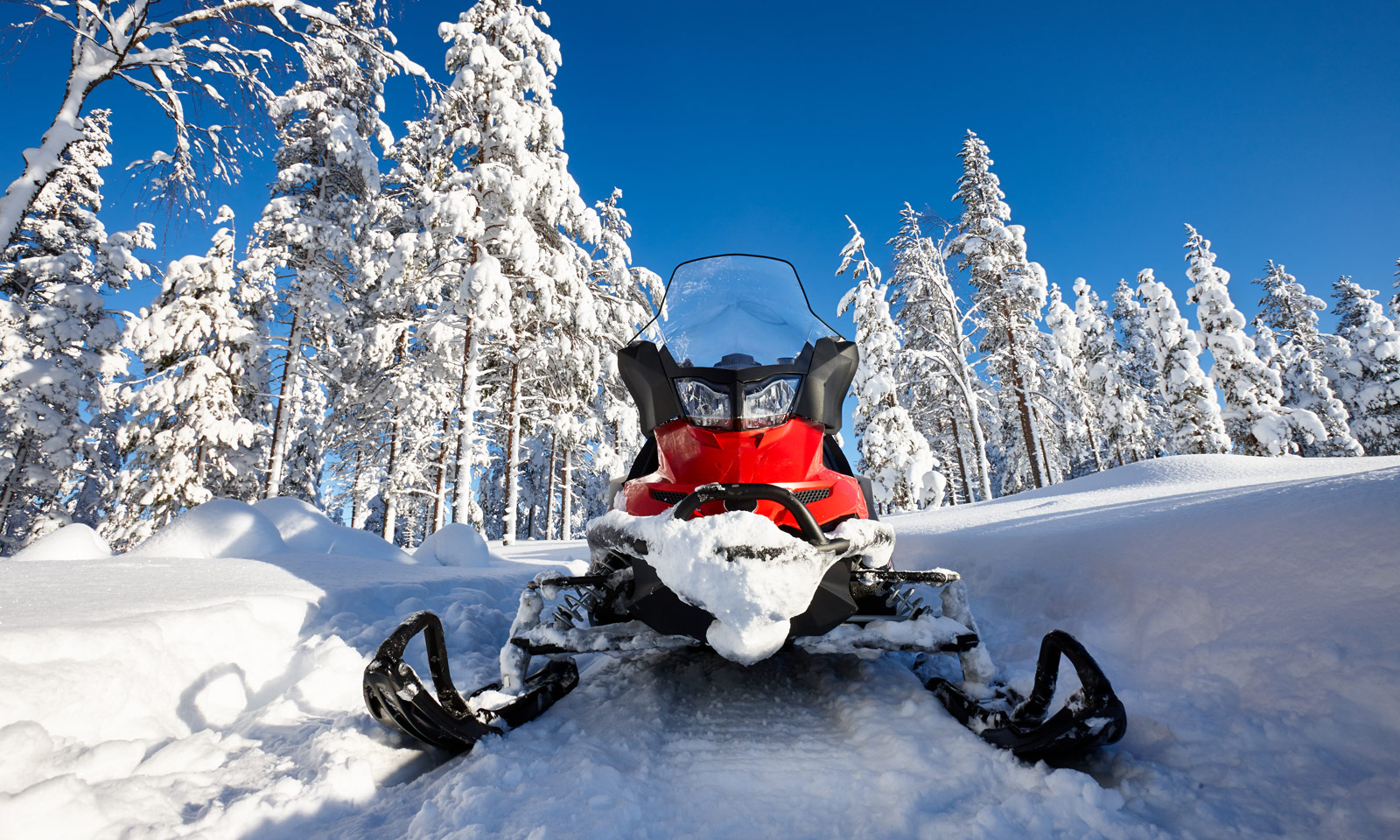 Snowmobile in newly fallen snow